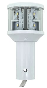 Technical illustration of a white masthead light with a 225-degree arc of illumination for power-driven boats