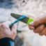 in use of McNett Akua Dive Knife