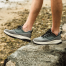 in use of Olukai Men's Makiki All-Terrain Athletic Shoe