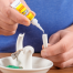 in use of Super Glue Super Glue - Single-use Tube - 5 Pack