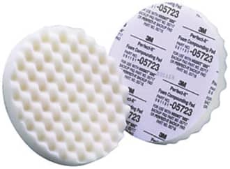 White foam compounding pad used with liquid abrasives for aggressive marine paint correction.