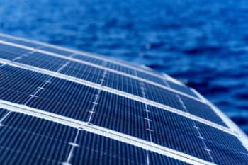 High-efficiency monocrystalline marine solar panels installed on a boat.