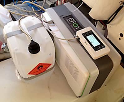 Compact EFOY fuel cell unit showing compact installation for silent onboard electricity generation.