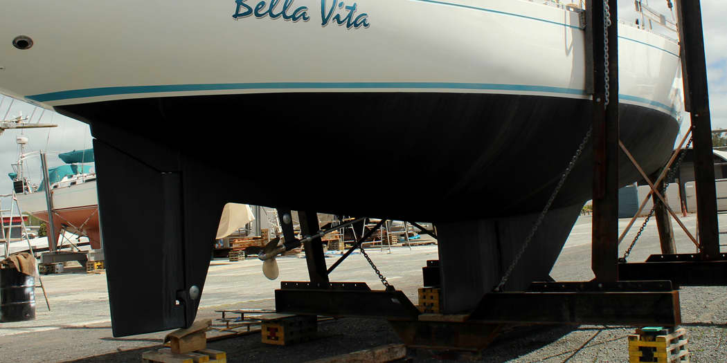 Boat hull with freshly applied, smooth bottom paint after an excellent job prepping the surface first.