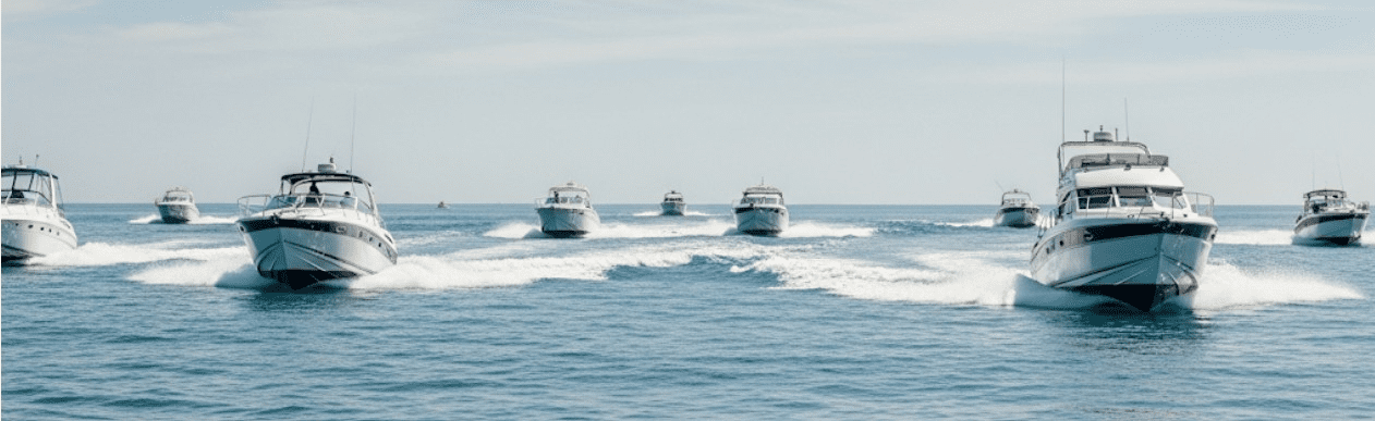 VHF antennas mounted on the hardtop of powerboats for long-range offshore communication.